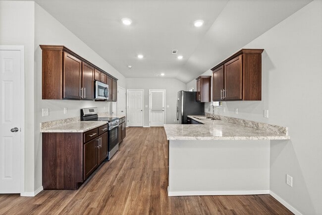 Building Photo - Charming Curb Appeal Meets Modern Comfort in the Monaco Plan!