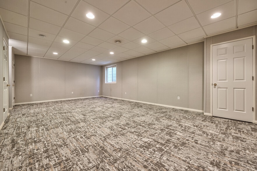 Basement rec room with new carpet - 22810 West 71st Terrace