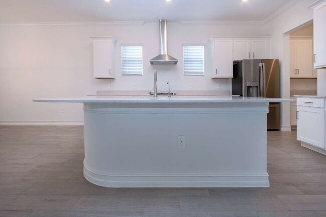 Building Photo - Spacious Like New 4-Bedroom Oasis with 3 F...