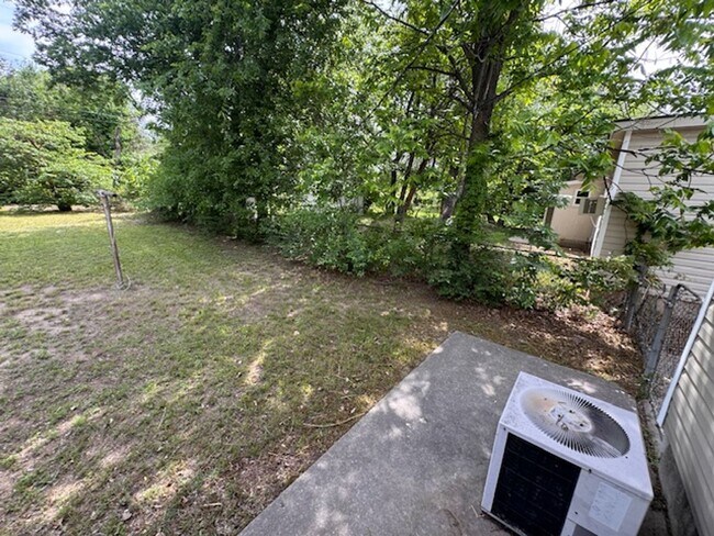 Building Photo - Norman 2 bed cutie, clean and ready for move in!  covered porch and storage shed!