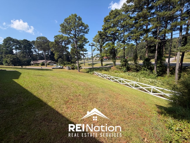Building Photo - MASSIVE BESSEMER RENTAL! 4BR/2.5BA | High Ceilings & Brick Fireplace | 2-Car Garage!