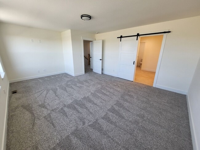 Building Photo - Beautiful New Construction!  3 Bedroom 2.5 Bath Townhome In Sweetgrass!!!!!