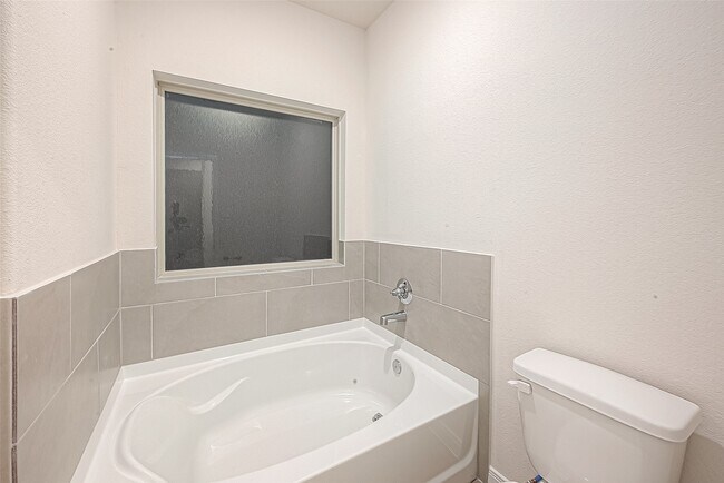 Building Photo - 8014 Fijian Cypress Dr