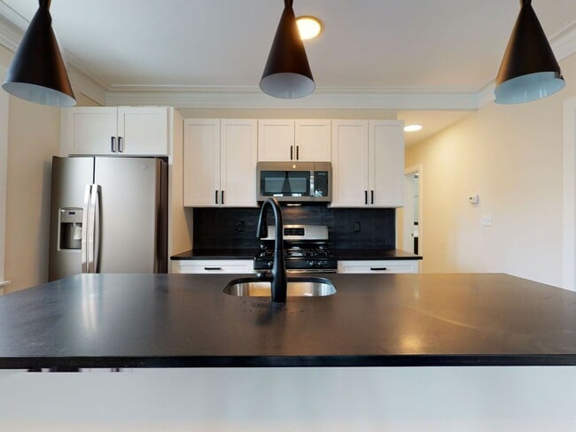 Building Photo - Must see 5-bedroom duplex…..