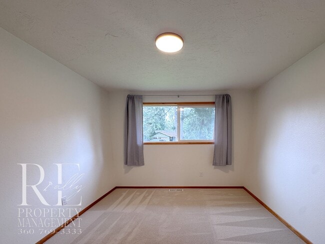 Building Photo - Bright & Spacious Single-Level Home with Dual Living Areas