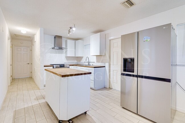 Building Photo - Say Goodbye to Electric Bills & Hurricane Outages with a Solar-Powered Home