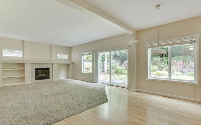 Building Photo - Spacious Four-Bedroom Home with Gourmet Kitchen, Multiple Living Areas, Loft, and Beautifully Lan...