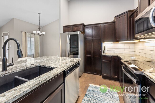 Building Photo - Spacious 4-Bedroom Home with Finished Basement & 3-Car Garage – Derby, KS