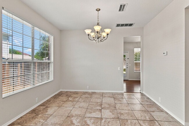 Building Photo - "Spacious Two-Story Home with Multiple Living Spaces and and Expansive Backyard!"