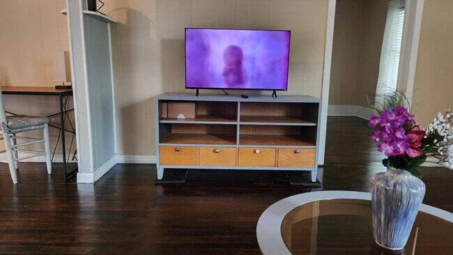 Watch sports/movies on your comfortable oversized couch. - 208 NW 3rd St