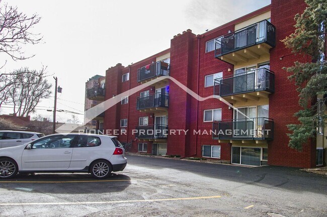 Building Photo - Cozy Condo with Assigned Parking Spot and Balcony