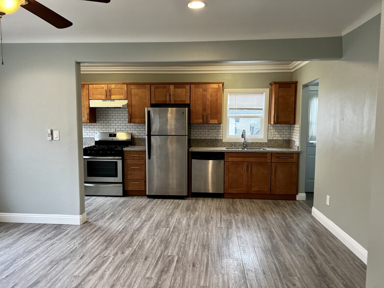 Open floor plan living room into kitchen - 378 S Vancouver Ave
