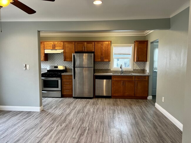 Open floor plan living room into kitchen - 378 S Vancouver Ave