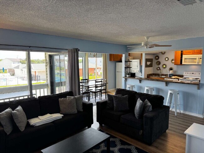 Primary Photo - "Coastal Comfort Awaits: Spacious 2-Bed, 2...