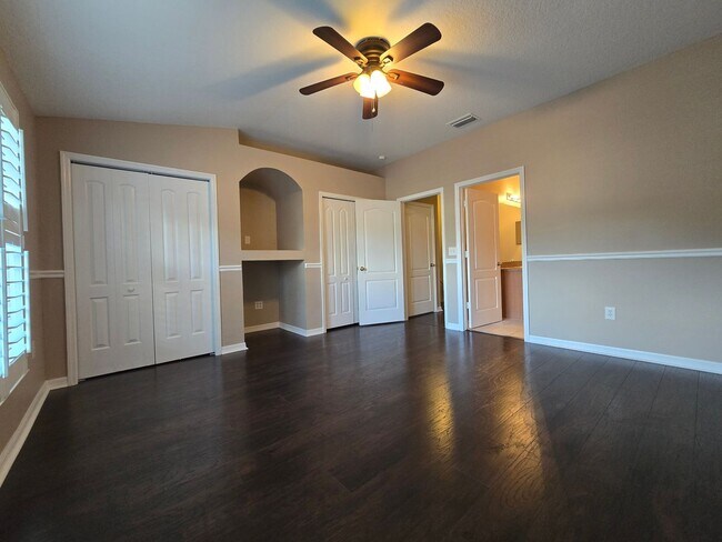 Building Photo - Great Town Home in Gated Community with Pool and Pond View