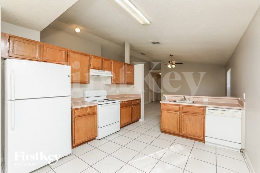 Building Photo - 7594 Groveoak Dr