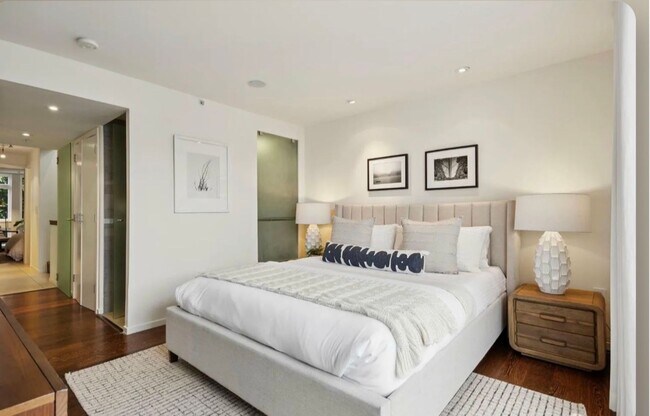 Building Photo - One-of-a-Kind Sophisticated Top-Floor Cond...