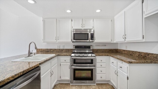 Building Photo - Upgraded 2-Bedroom Carriage Townhome with ...