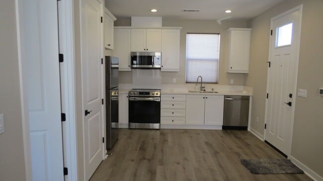 Building Photo - Modern 1 Bedroom Apartment in Desirable San Luis Ranch Homes- All Utilities Included