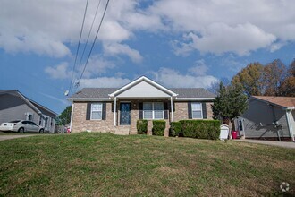 Building Photo - Three Bedroom with Fenced Yard!