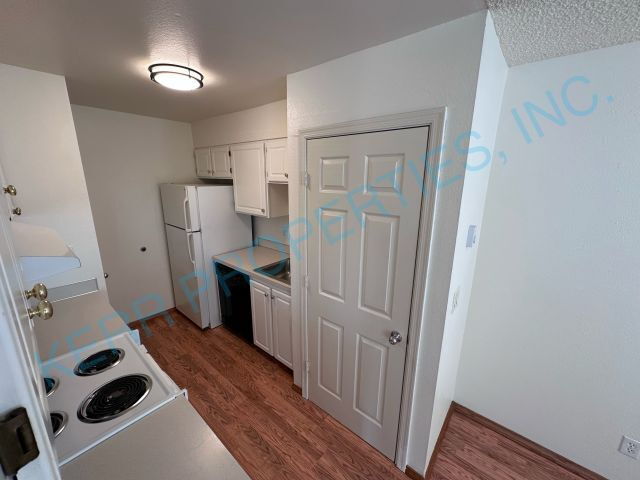 Building Photo - Charming 2-Bed Condo with Modern Comforts ...