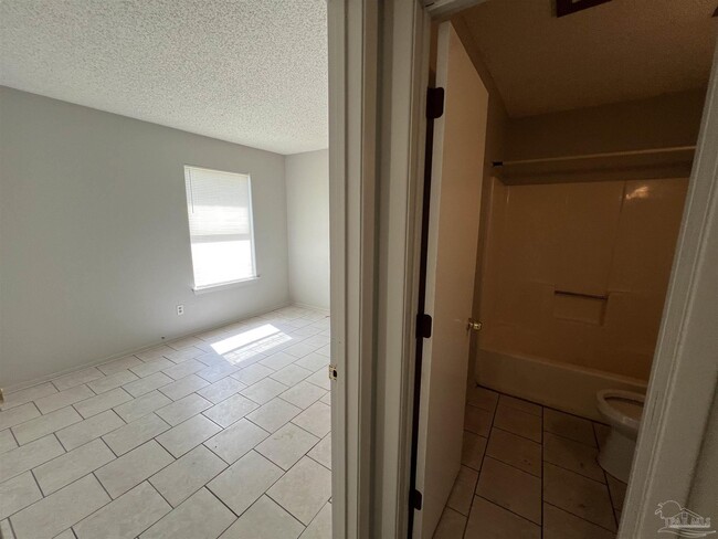 Building Photo - 6809 Tiki Ln