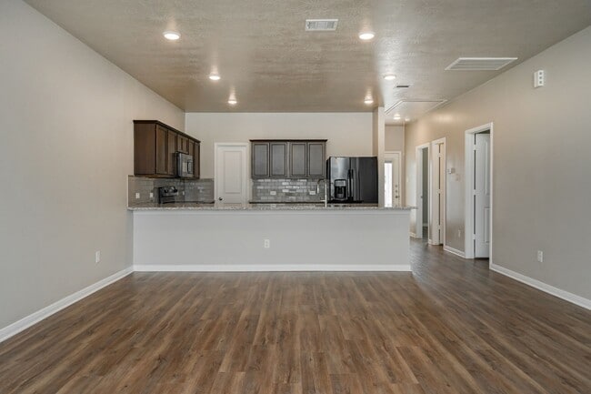 Building Photo - Where Style Meets Comfort: Elevate Your Living Experience