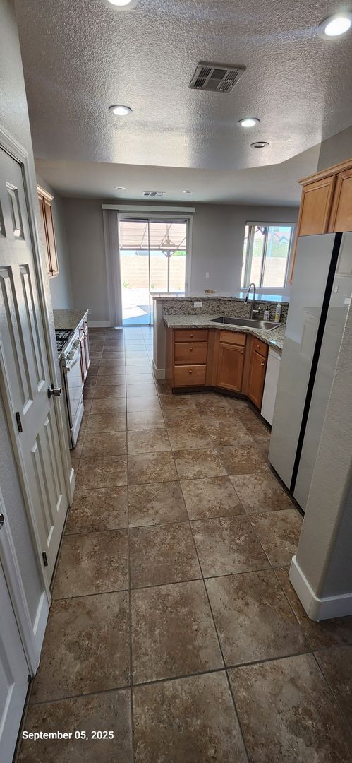 Building Photo - Spacious 4-Bedroom Home with Modern Update...