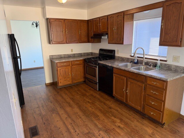 Kitchen includes stove, refrigerator and dishwasher - 256 Spencer Pl
