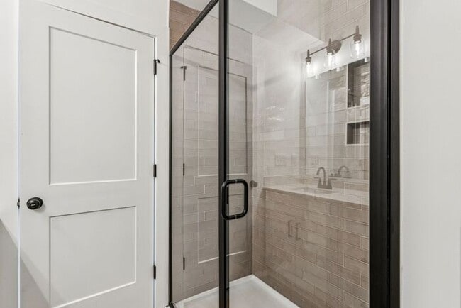 Building Photo - High-End 2BR Townhome | Rooftop Terrace + 2-Car Garage | 24-Unit Community