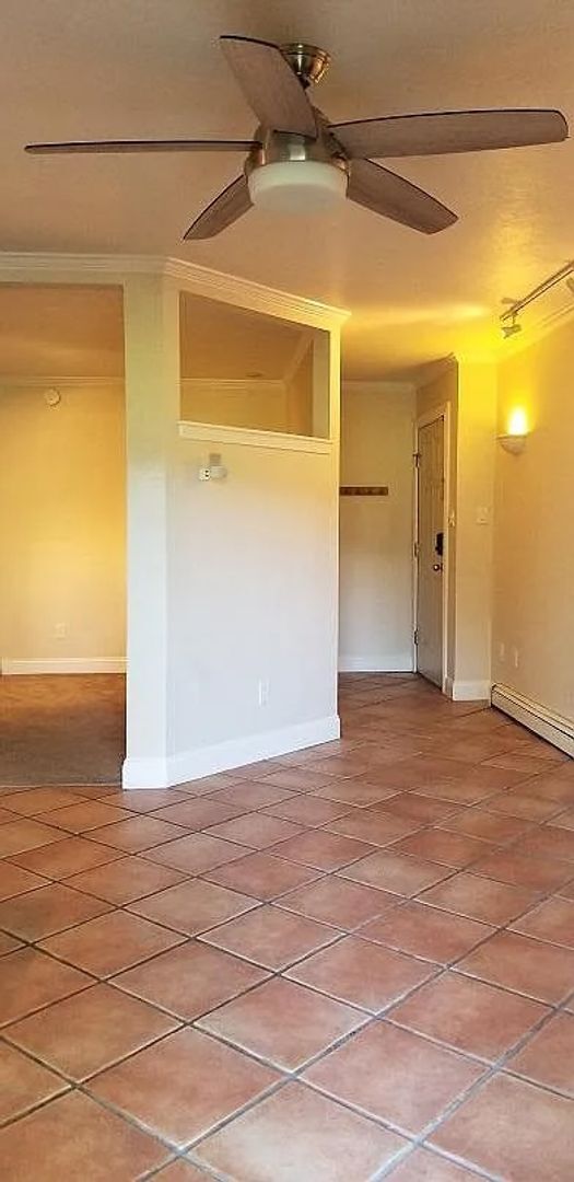 Building Photo - One Bedroom Condo Walking Distance to CU with Fenced Backyard and Flatiron Views!