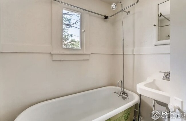 Building Photo - Charming Historic Carriage Home Steps from Pearl Street - Boulder Living at Its Finest!