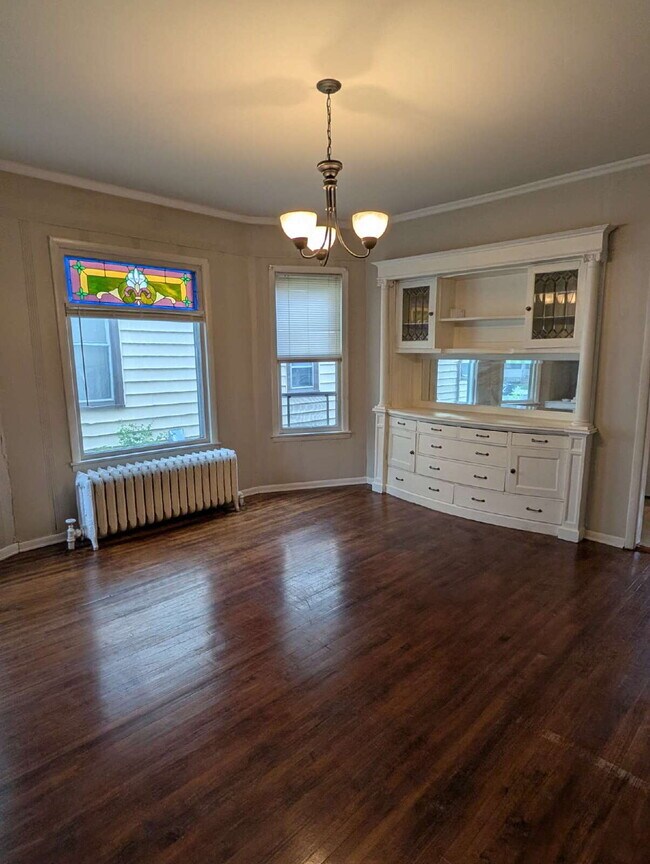 Building Photo - Bright & Charming 3BR With Garage Included In NE Minneapolis