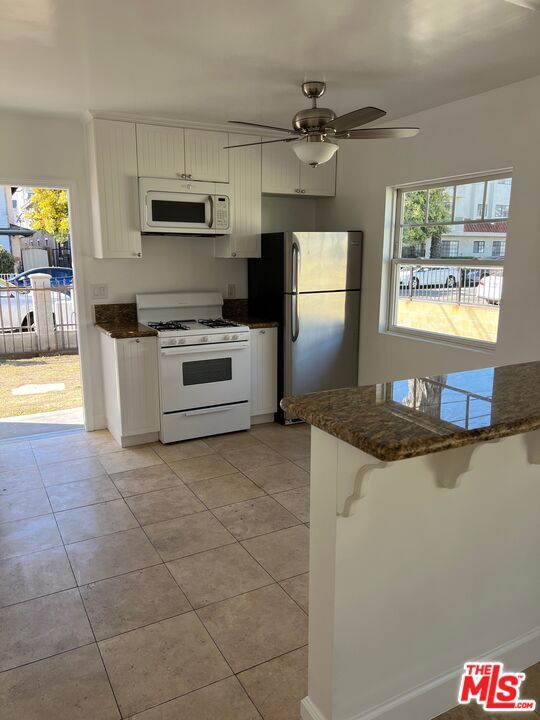 Building Photo - 13636 Cerise Ave