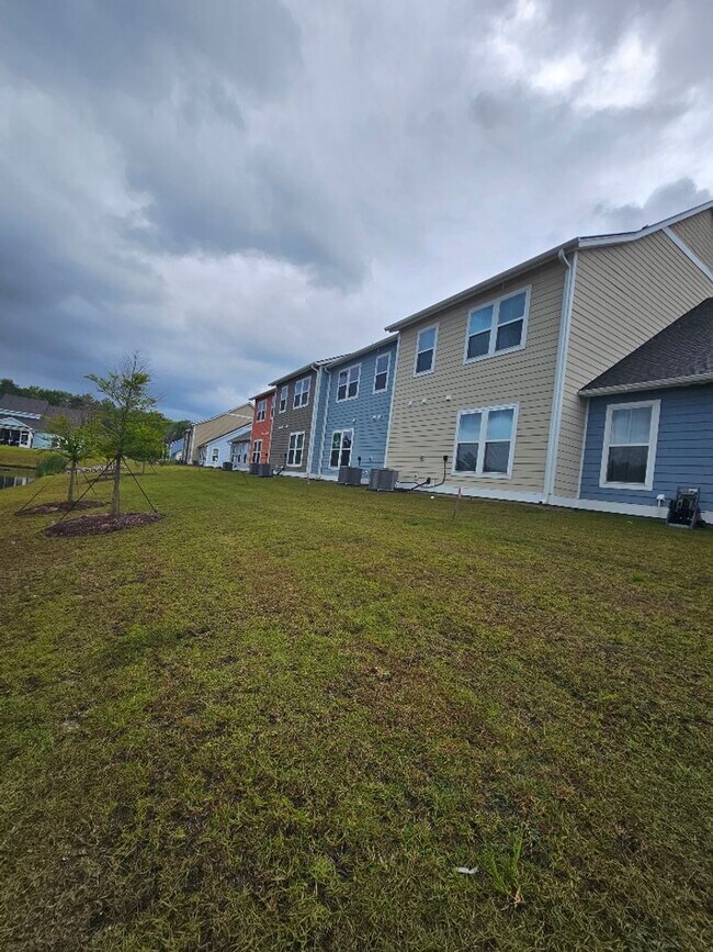 Building Photo - Belle Harbour @ Market Common