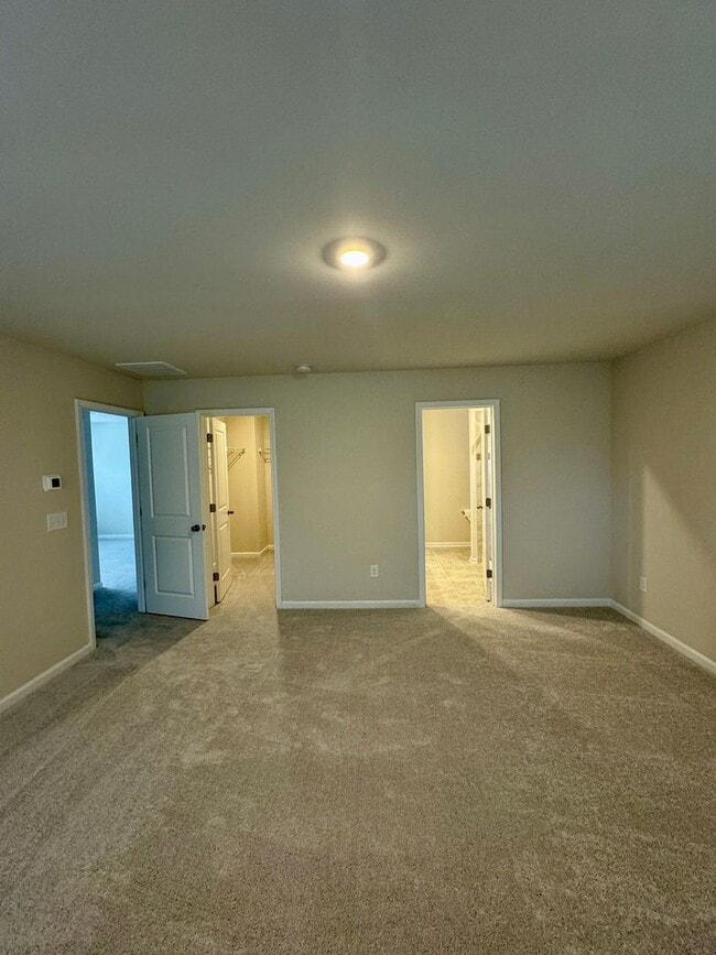 Building Photo - 4BR/2.5BA in Steel Creek's Brightwater Neighborhood