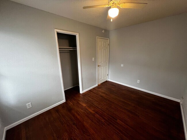Building Photo - Freshly Painted 2-Bedroom with Refinished Hardwood Floors
