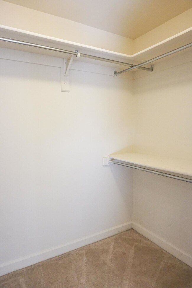 Building Photo - Beautiful brick townhome featuring three f...