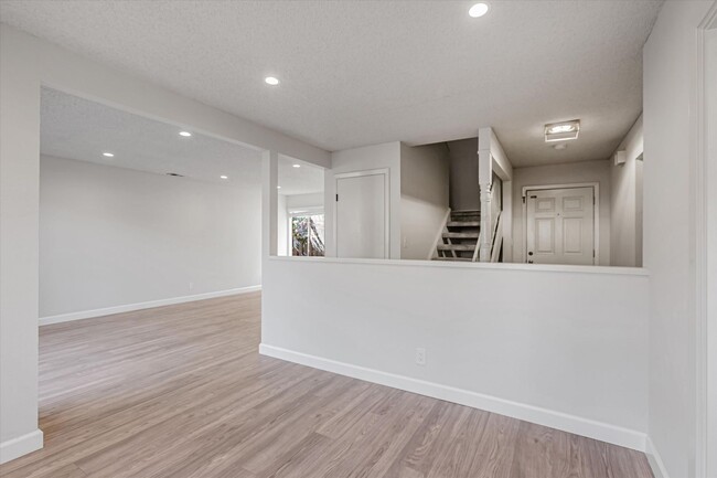 Building Photo - Fully Renovated, 4 Bedroom Townhome Availa...