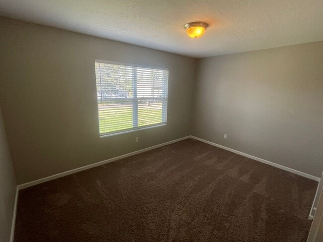 Building Photo - Mead Schools-4 bedrooms, 2 bathrooms House with 2 Car Detached Garage