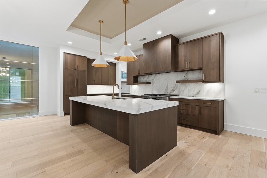 Expansive open concept living space with floor to ceiling windows and seamless flow into the kitchen - 3718 West End Ave