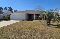Building Photo - Coastal Getaway: Stunning 3-Bedroom Retrea...