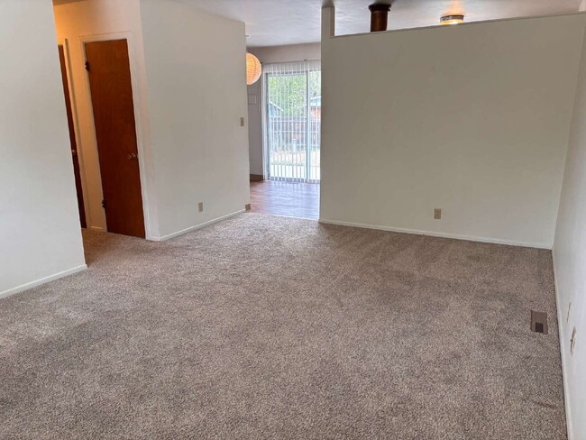 Building Photo - 3 BR bright, sunny, meticulously cared for house with large fenced yard and attached garage. Offe...