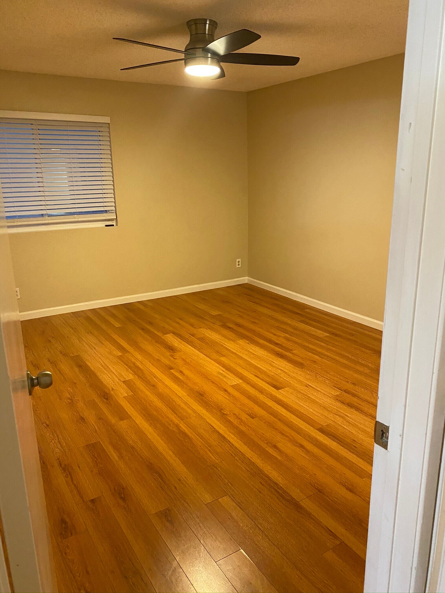 Master bedroom with ceiling fan - 5706 Fair Ave