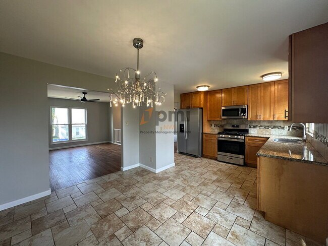 Building Photo - 1031 W 59th Pl