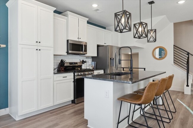 Building Photo - Modern 3BD, 2.5BA Virginia Village Townhome with 2-Car Garage