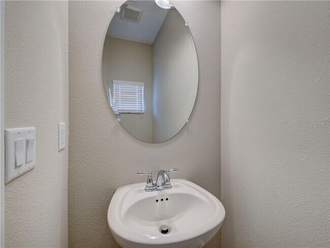 New High-quality half bath on the first floor. Plus two full Bath in addition. Total 3 baths. Luxuri - 1074 Amber Leaf Trail