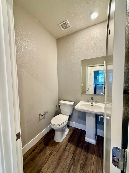 Half Bath in Living Room - 204 Plum Tree St