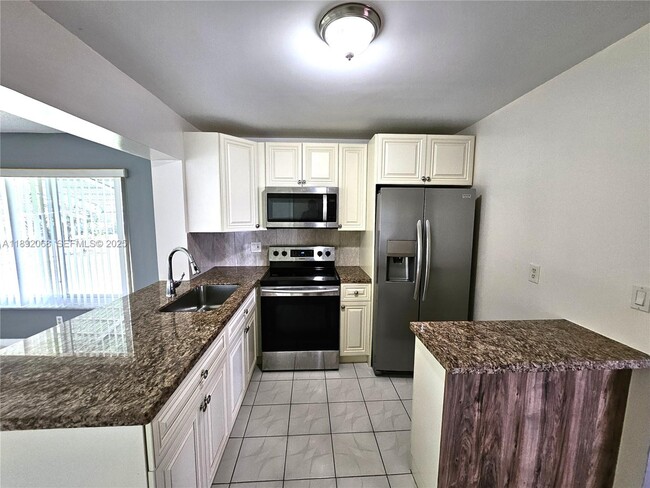 Building Photo - 1040 NW 73rd Terrace