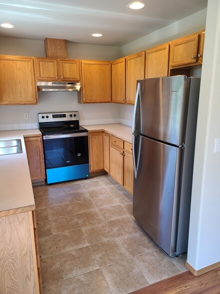 New countertops, fixtures, SS appliances and flooring for kitchen - 246 163rd St S